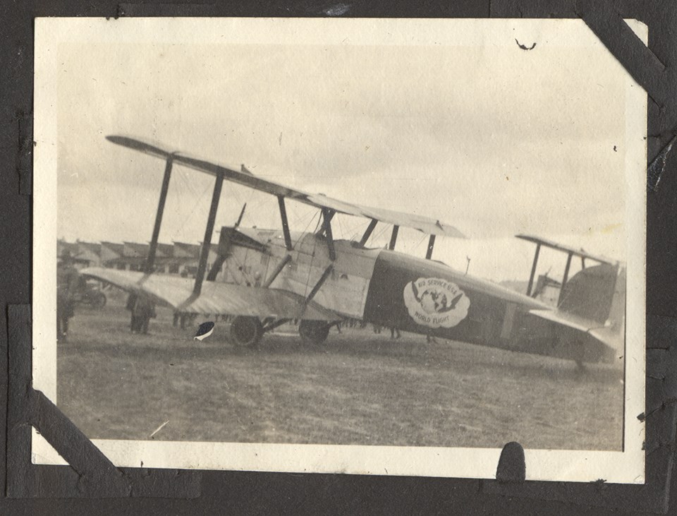 Black and white photo of biplane