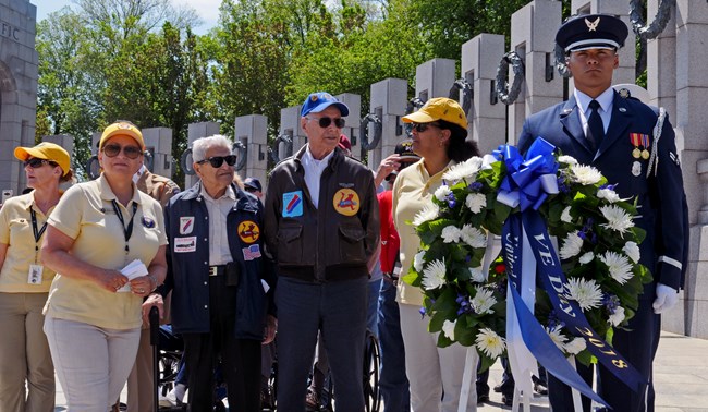 V-E Day 2018 A group prepares to lay a wreath at the World War II Memorial