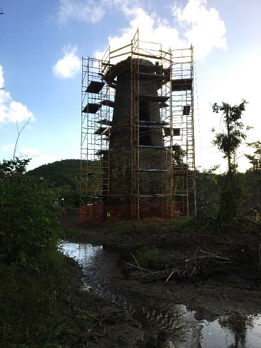 Well tower A scaffold assembly, safety rails, bridge planking and decking.