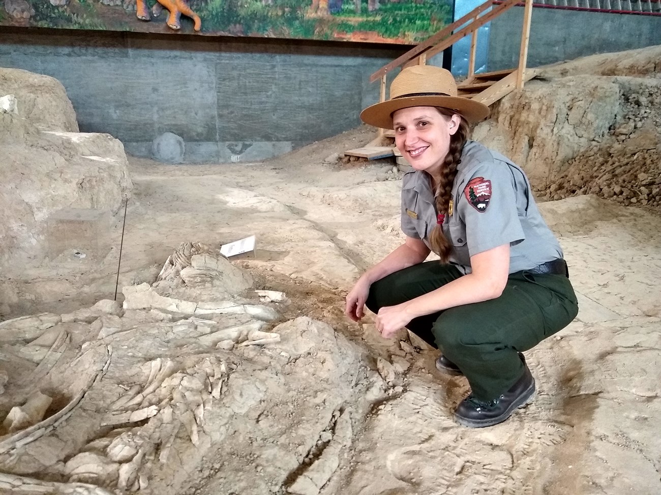 Yann in dig shelter park ranger in fossil dig site