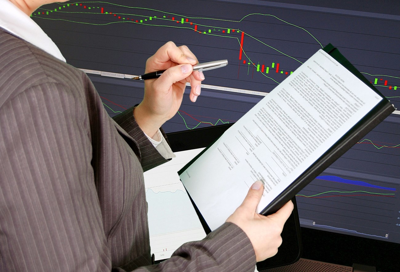 business woman with pen and paper