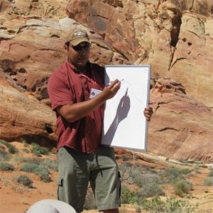 Bonde 2 Scientist with whiteboard near rock cliff