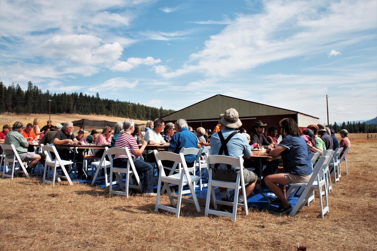 The Kalispel Tribe worked with the Rivers, Trails and Conservation Assistance program to bring the community to the table. At the open house participants shared a family-style meal of Indian tacos. National Park Service photo.