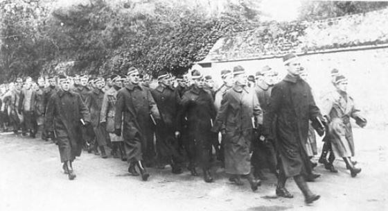 Uniformed soldiers marching