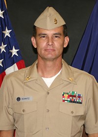 a man in brown military uniform