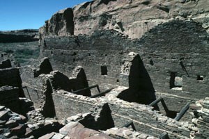 [photo] Ruins of masonry buildings in desert valley.