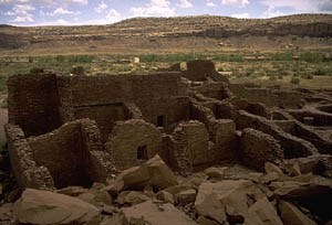 [photo] Ruins of masonry buildings in desert valley.