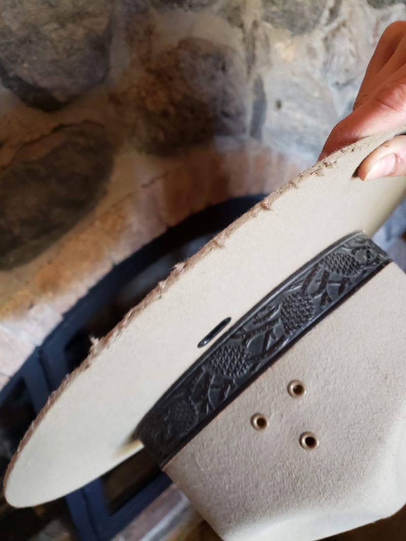 NPS Flat Hat with brim edges chewed by a mouse.