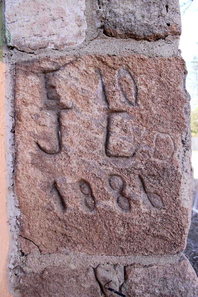 historic inscription on stone 1886