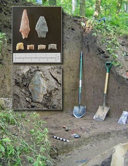 [photo] Excavated embankment, with inset showing ancient tools found onsite.