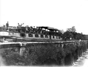 Historic photo of canal boat crossing aquaduct. Historic photo of canal boat crossing aquaduct.