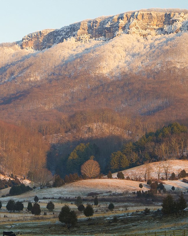 ridge and cliffs with snow