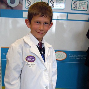 boy in lab coat