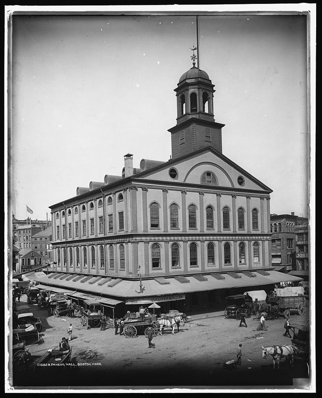 Black and white photo of the exterior of Faneiul Hall