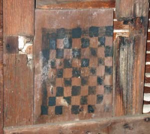 Photo of wooden checkerboard. Photo of wooden checkerboard.