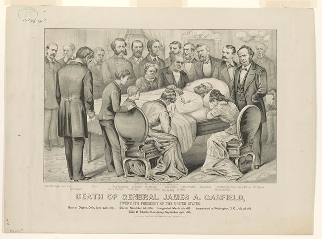 President Garfield is in bed. He is surrounded by people who are sobbing.