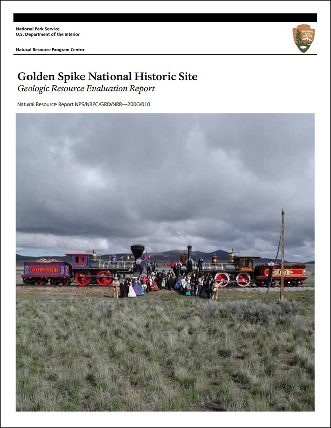 gri report cover with photo of trains meeting