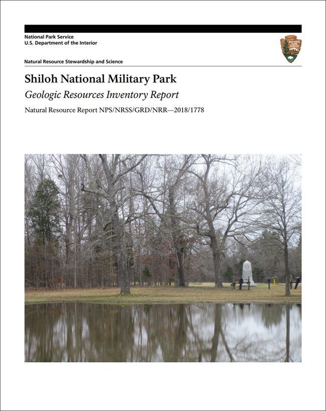 cover of gri report with photo of a park pond