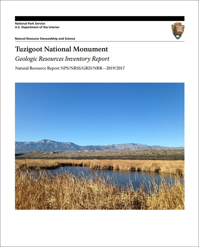 cover of gri report with photo of valley and mountains