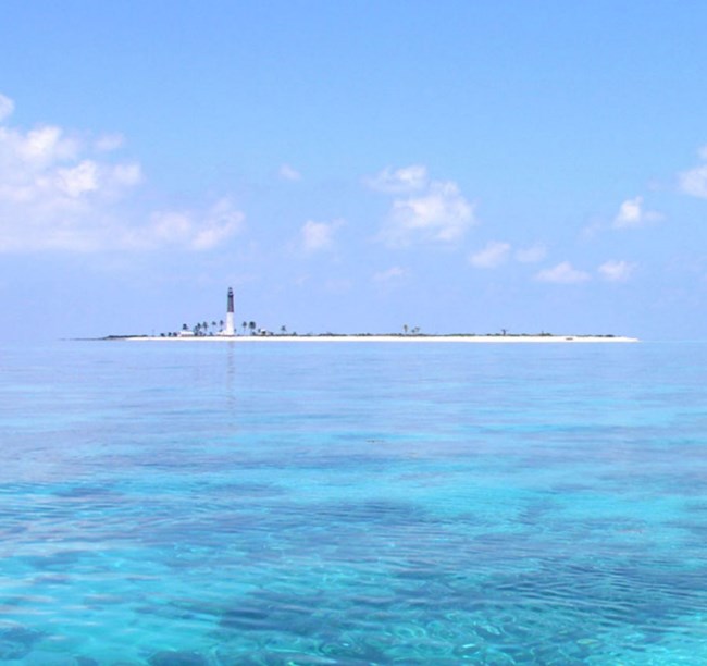 view across channel to key and lighthouse