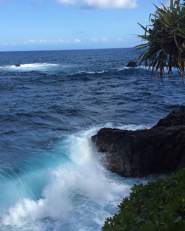 wave breaking on shoreline