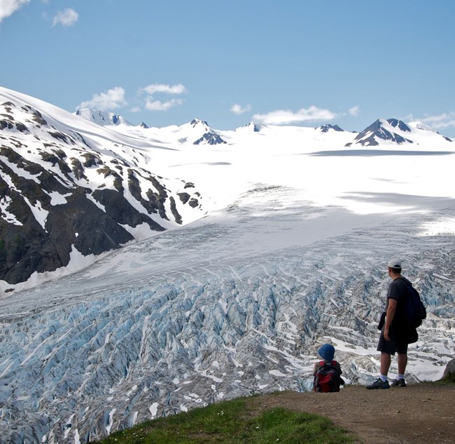 hikers at glacier overlook
