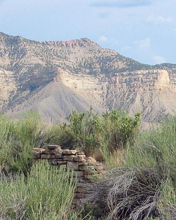 ruins and distant cliffs