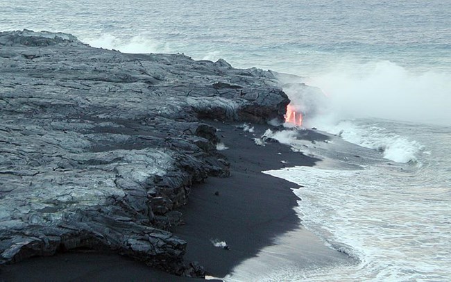 havo_black sand_usgs lava and black sand on beach