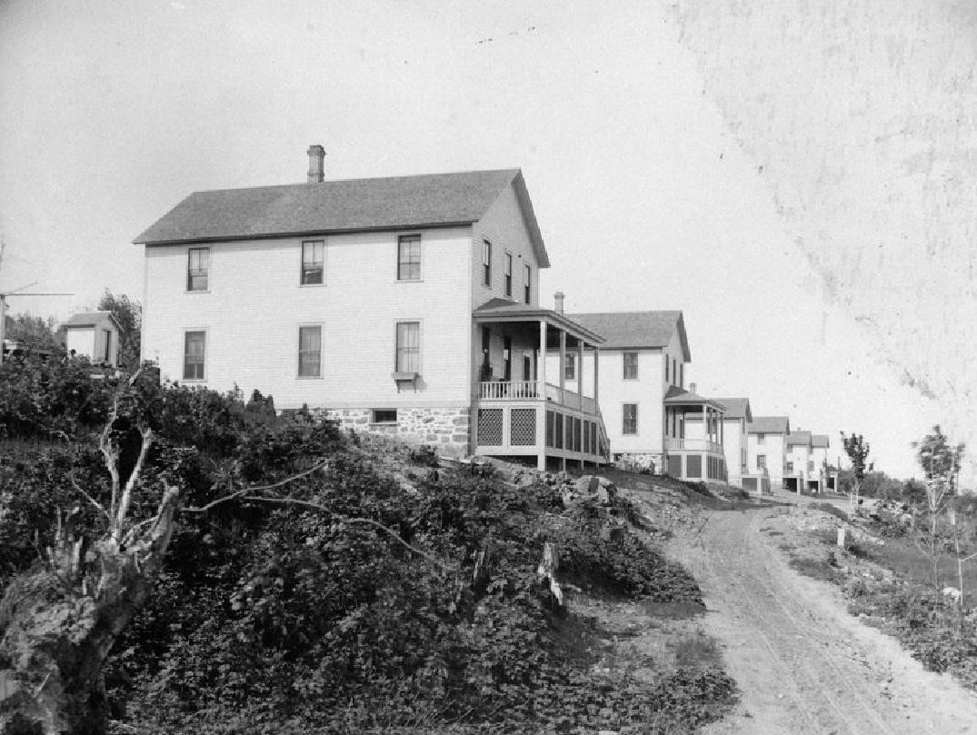 Row of two-story houses.