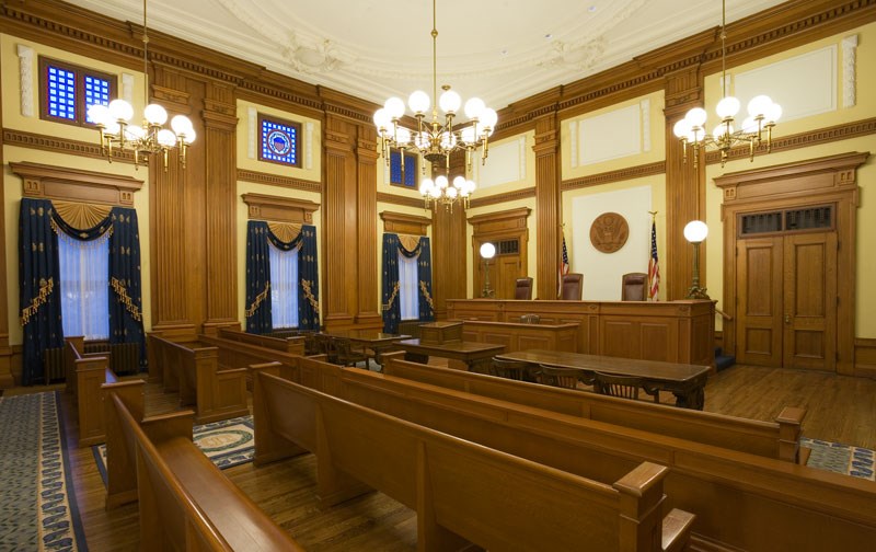 Inside of courtroom with benches. (General Services Administration) Inside of courtroom with benches. (General Services Administration)