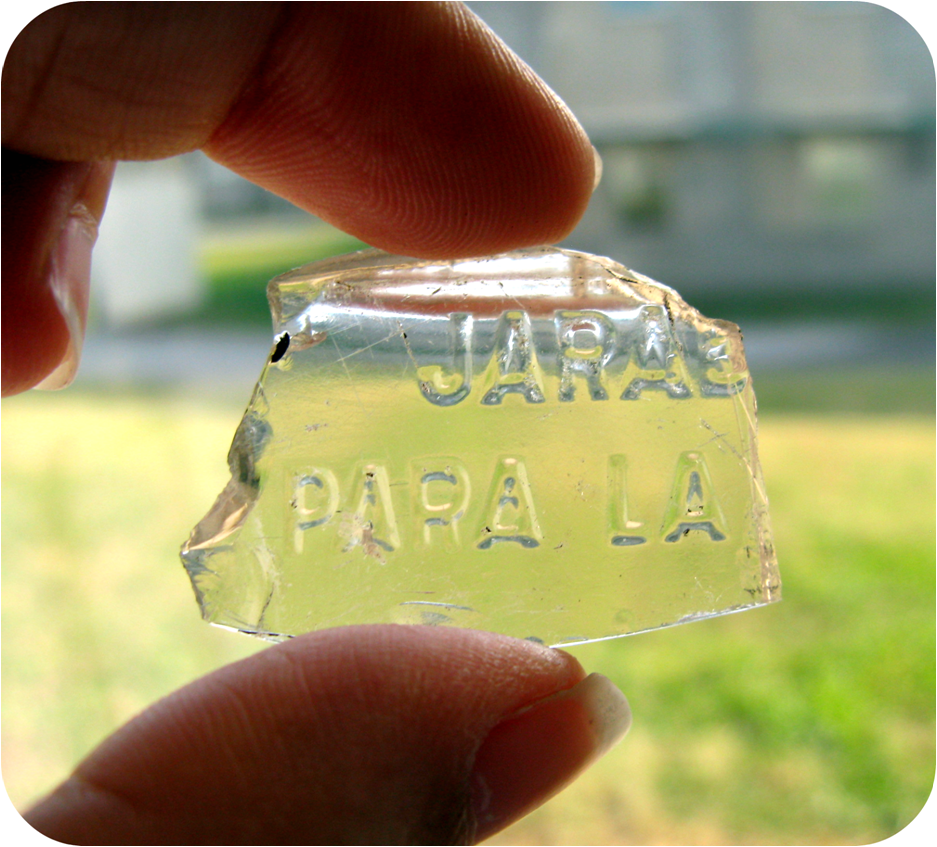 Glass piece from a cough syrup bottle