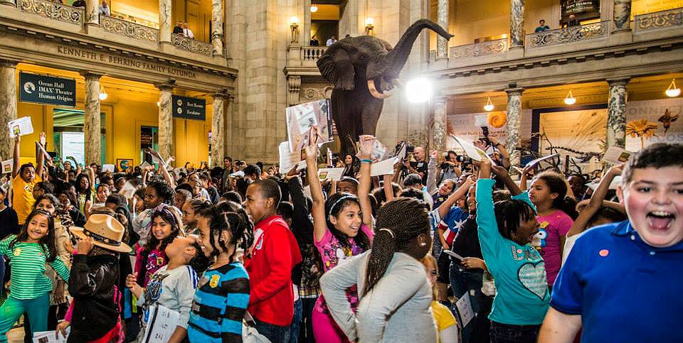 children celebrate NFD in museum lobby