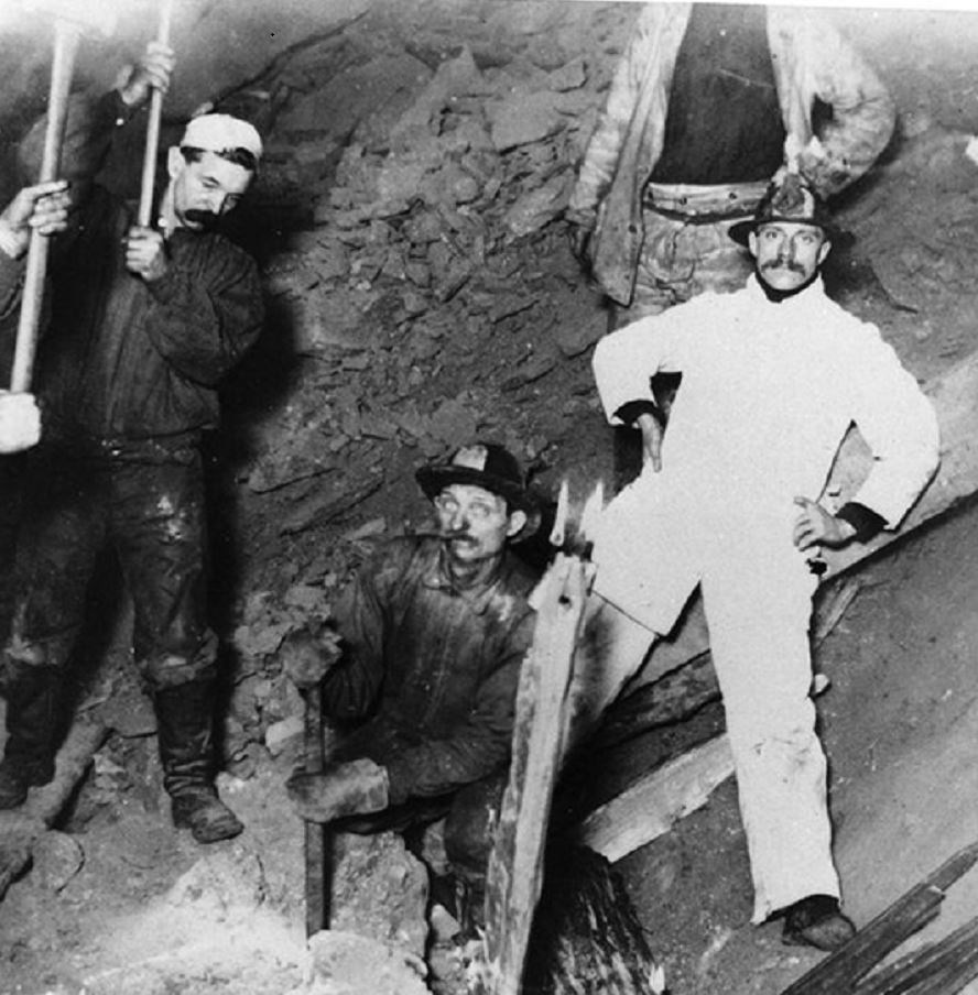 Men standing in mine.