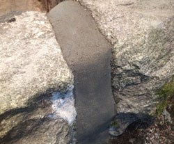 mortarweb dark grey mortar in granite crack