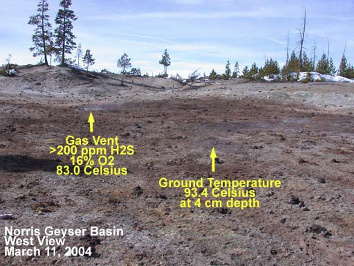 A view of a landscape with snow and bare ground exposed; two labels on the image marked left to right: Gas Vent > 220 ppm, 16% O2, 83.0 Celsius; Ground Temperature 93.4 Celsius, at 4 cm depth