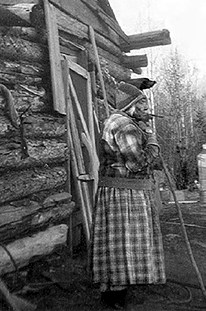 Ogema quaince 102 old women out side of log cabin 1929