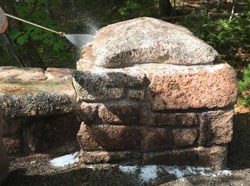 power-washingweb a pressure washer sprays a stone bridge