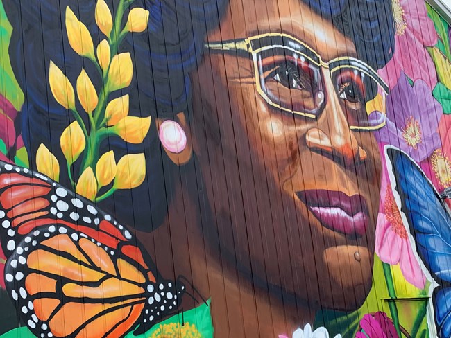 A colorful mural of US Congresswoman Shirley Chisholm of Brooklyn