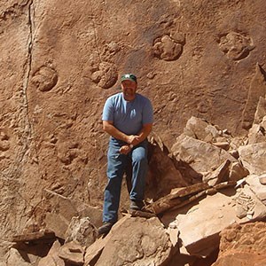 vincent l santucci 1 vince standing at large fossil trackway