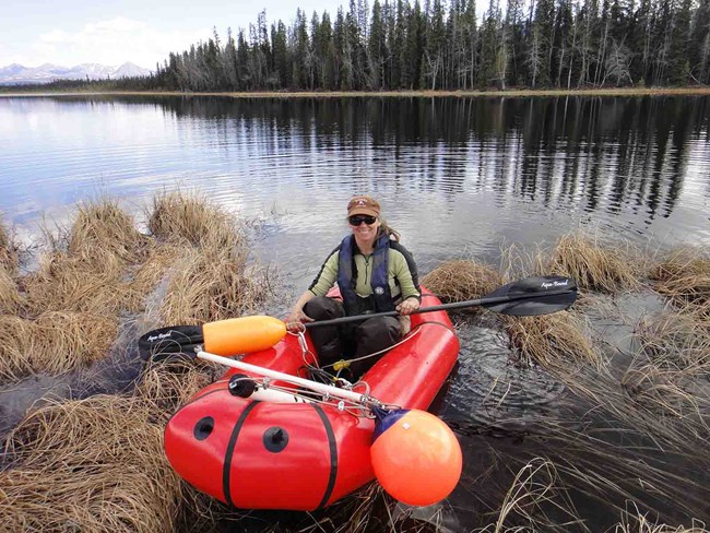 Amy Larsen Amy Larsen doing shallow lake field work.