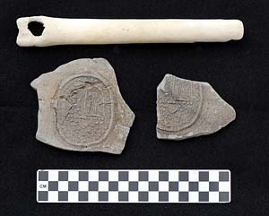 AD 1650-1670 Bellarmine or Bartmann bottle sherds found in submerged context with bone tool. (NPS photo)