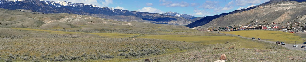 Looking northwest from the North Entrance of Yellowstone, the town of Gardiner, Montana, on the right.