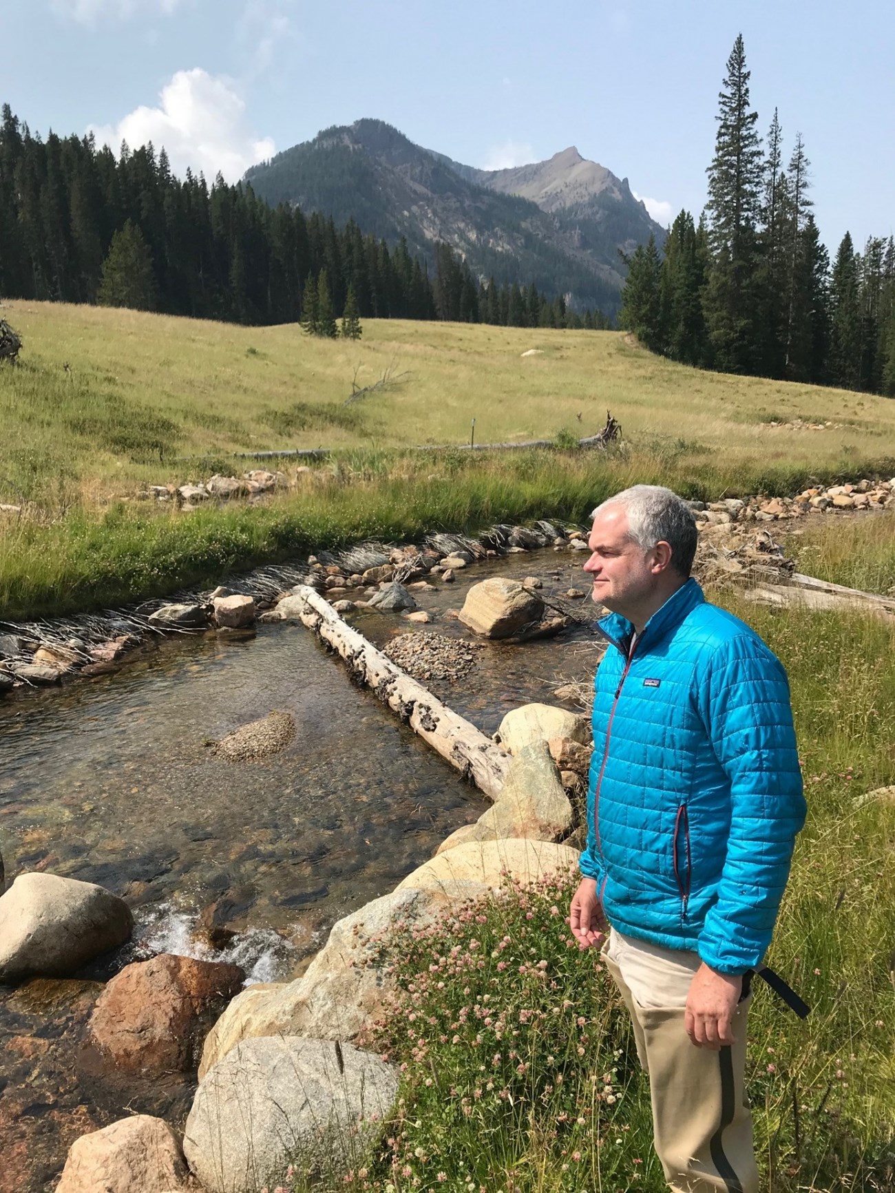 tom_henderson Photo of the late Tom Henderson standing by Soda Butte Creek.