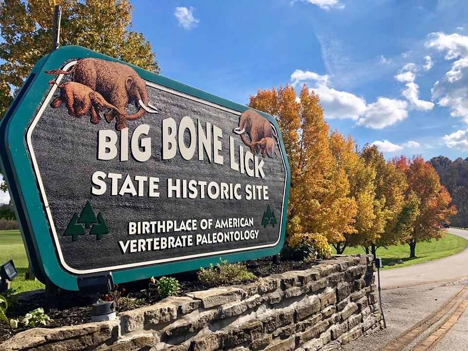 2025 SPRING PP NEWSLETTER - FIGURE 1 - BIBO TWEET The entrance sign to Big Bone Lick State Historic Site, describing it as the “birthplace of American vertebrate paleontology”. Mastodons are depicted on the sign as well.
