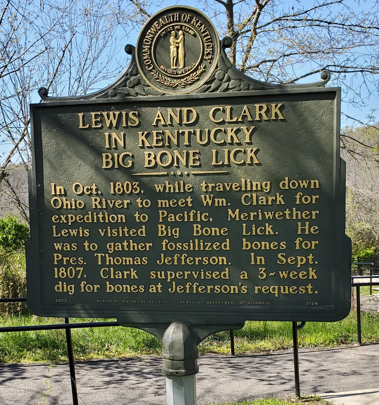 2025 SPRING PP NEWSLETTER - FIGURE 4 - BIBO TWEET A sign that reads “Lewis and Clark in Kentucky: Big Bone Lick. In Oct. 1803, while traveling down Ohio River to meet Wm. Clark for expedition to Pacific, Meriwether Lewis visited Big Bone Lick. He was to gather fossilized bones for Pres. Thomas Jefferson.