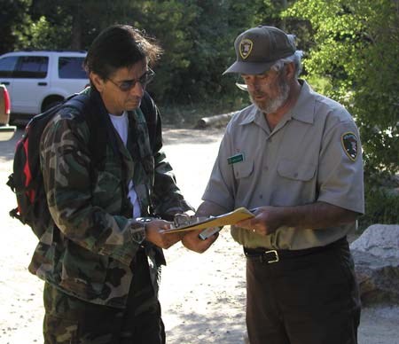 Volunteers distributed a survey, camera, and journal to hikers at trailheads.