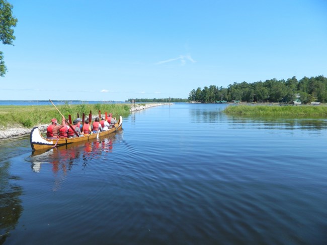 Park visitors canoeing on a historic water route