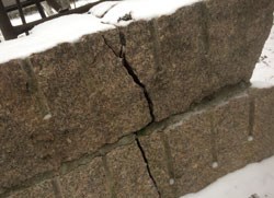 Cracked Stone a large crack running vertically through granite slab