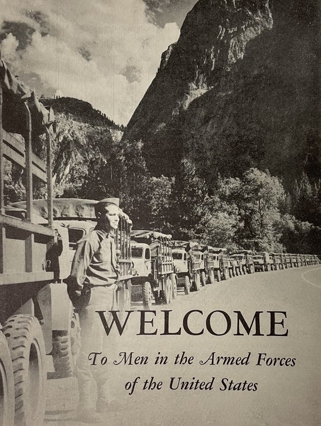 NPS WWII welcome pamphlet Cover of pamphlet with military vehicles lined up along a road with mountains behind. "Welcome to the Men of the Armed Forces of the United States"