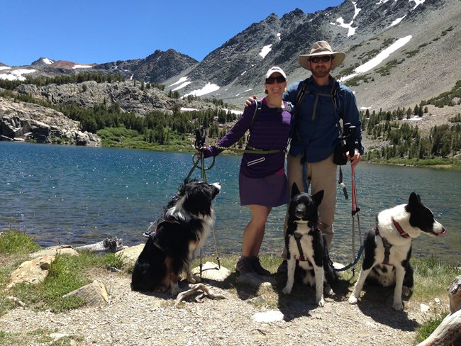 Finnerty and Winters with their dogs